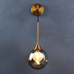 Applique murale pendante dorée avec boule de verre ambre ou gris fumé